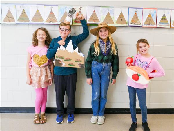 Fifth Graders putting on a Pun Fashion Show.